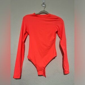 Skims neon orange long sleeve bodysuit size M
